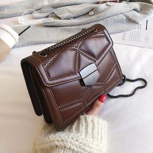 Rivet studded shoulder bags